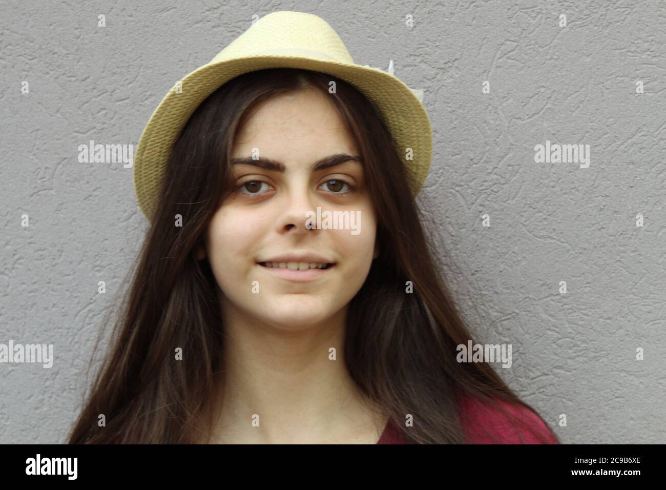 Young girl with a straw hat Stock Photo Alamy