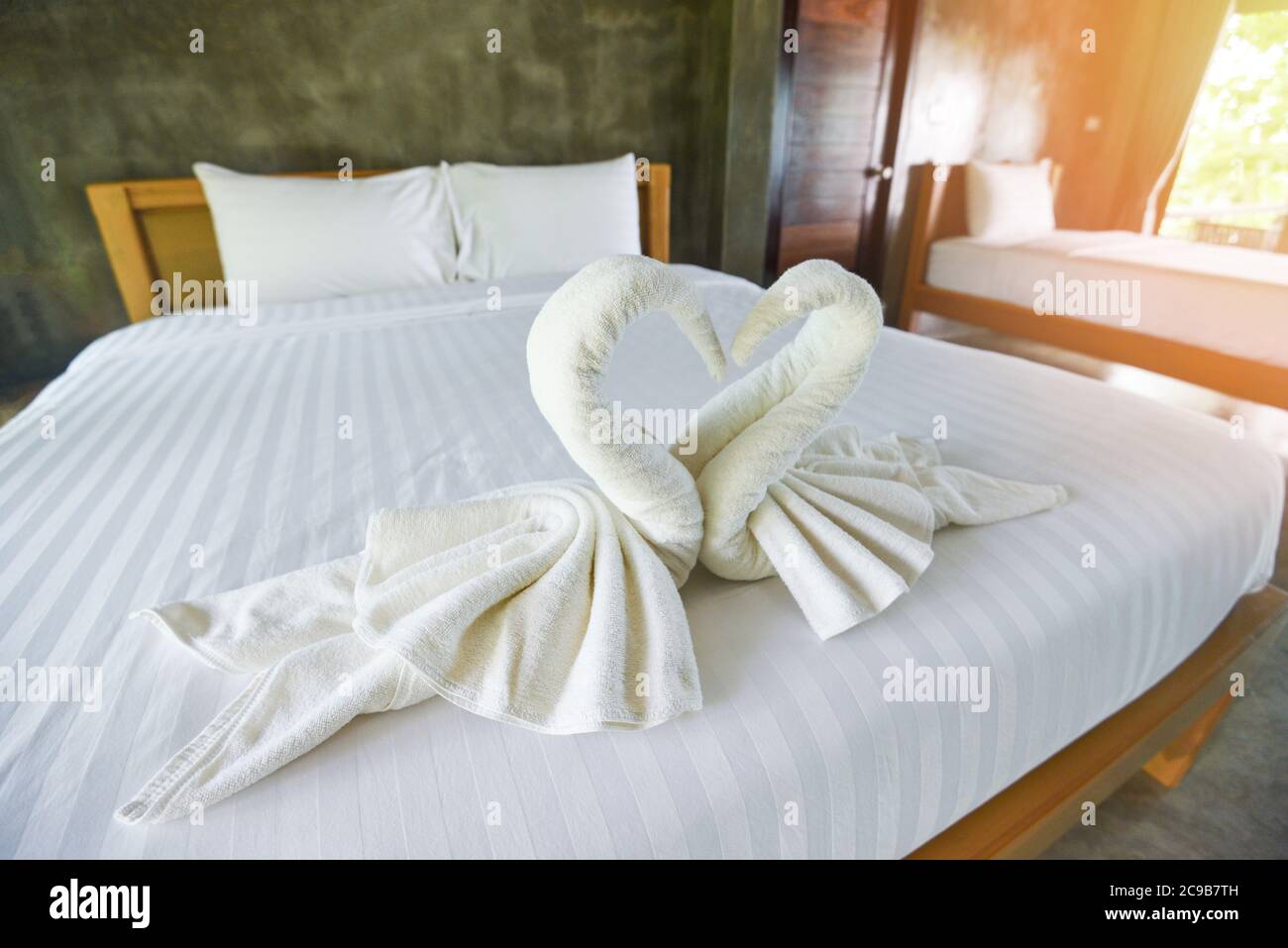 White clean bath towel on bed decoration interior of bedroom White towel on bed in guest room for hotel customer Stock Photo Alamy