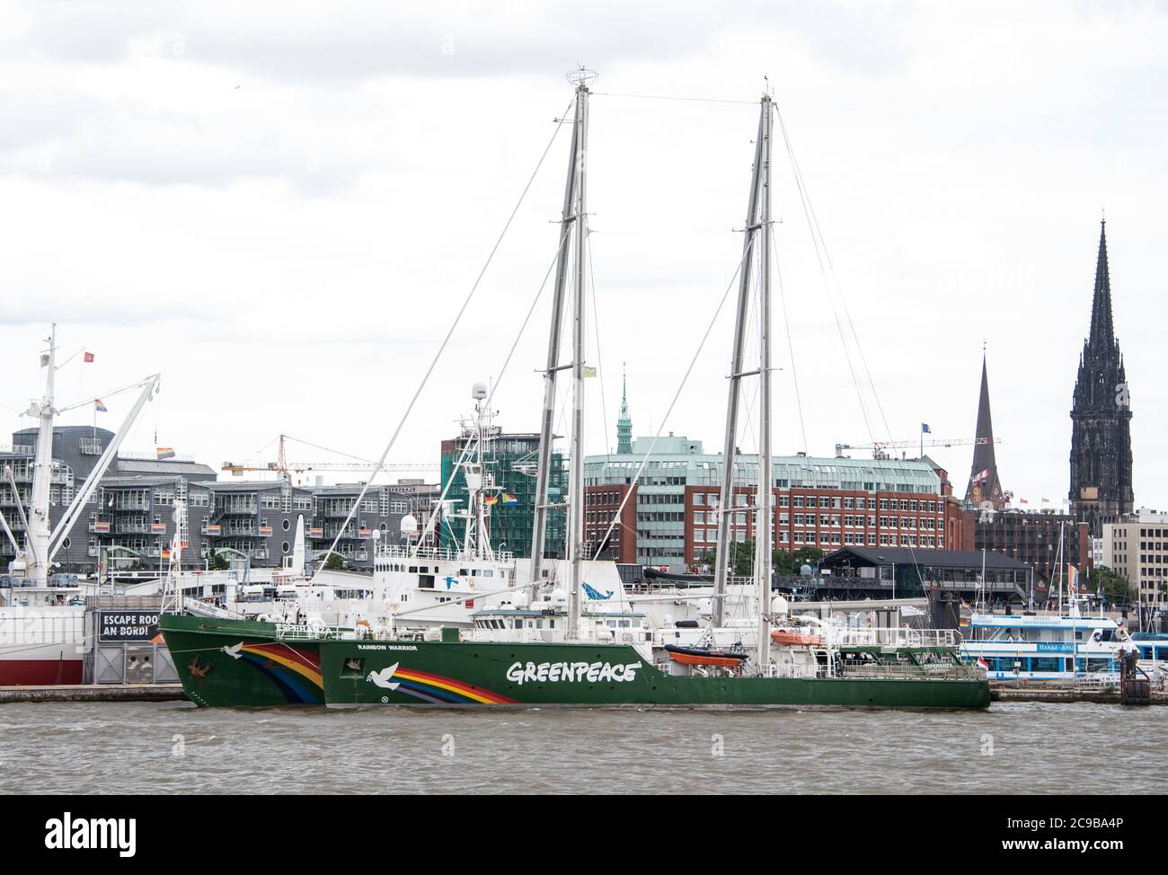 Hamburg, Germany. 29th July, 2020. The Greenpeace ships Esperanza (back) and Rainbow Warrior are moored in the harbour at the landing stages. On 30.07.2020 Greenpeace sets off for the North Sea to document the destruction of the marine environment by the oil and gas industry. Credit: Daniel Bockwoldt/dpa/Alamy Live News Stock Photo