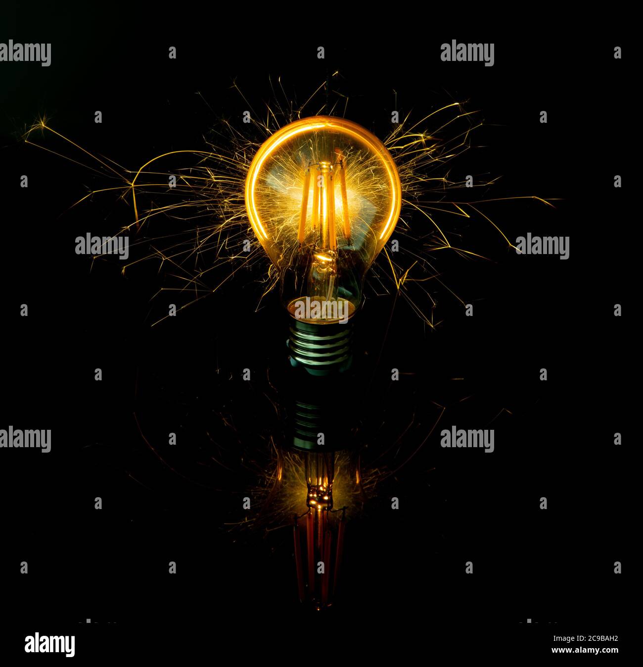 Light Globe Moment with Sparkler Stock Photo