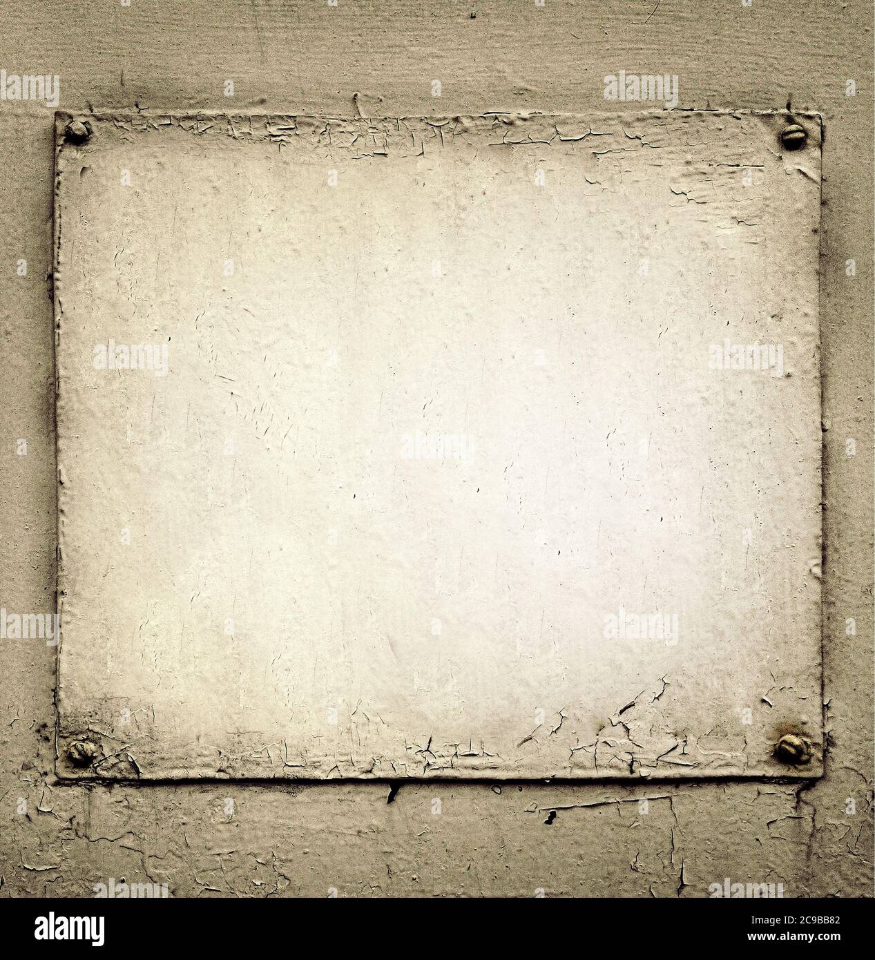 old grungy white painted plaque Stock Photo