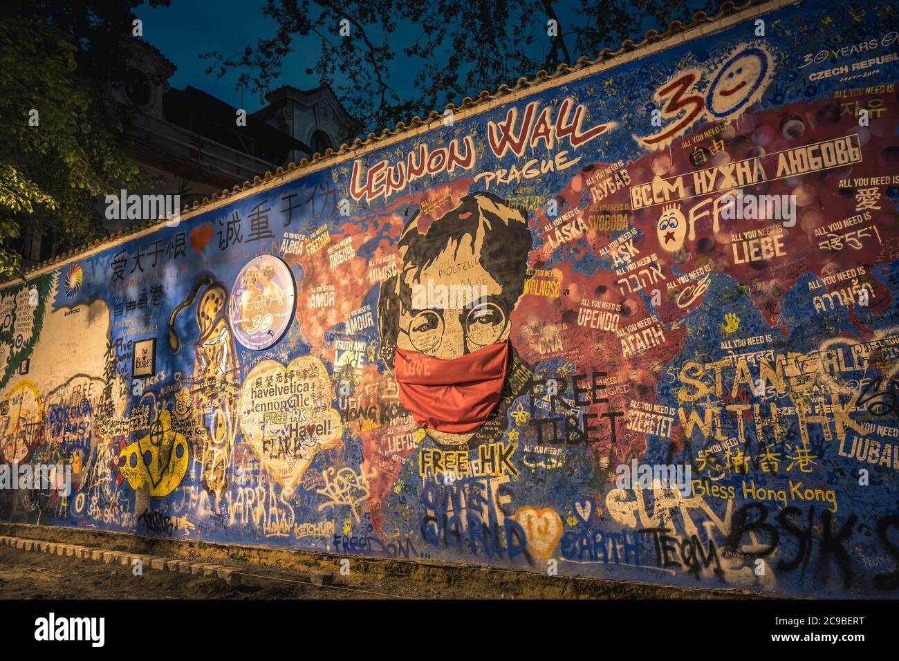 PRAGUE, CZECH REPUBLIC, APRIL 2020 - The John Lennon Wall. Famous place in Prague - Wall is filled with John Lennon inspired graffiti and lyrics from Stock Photo