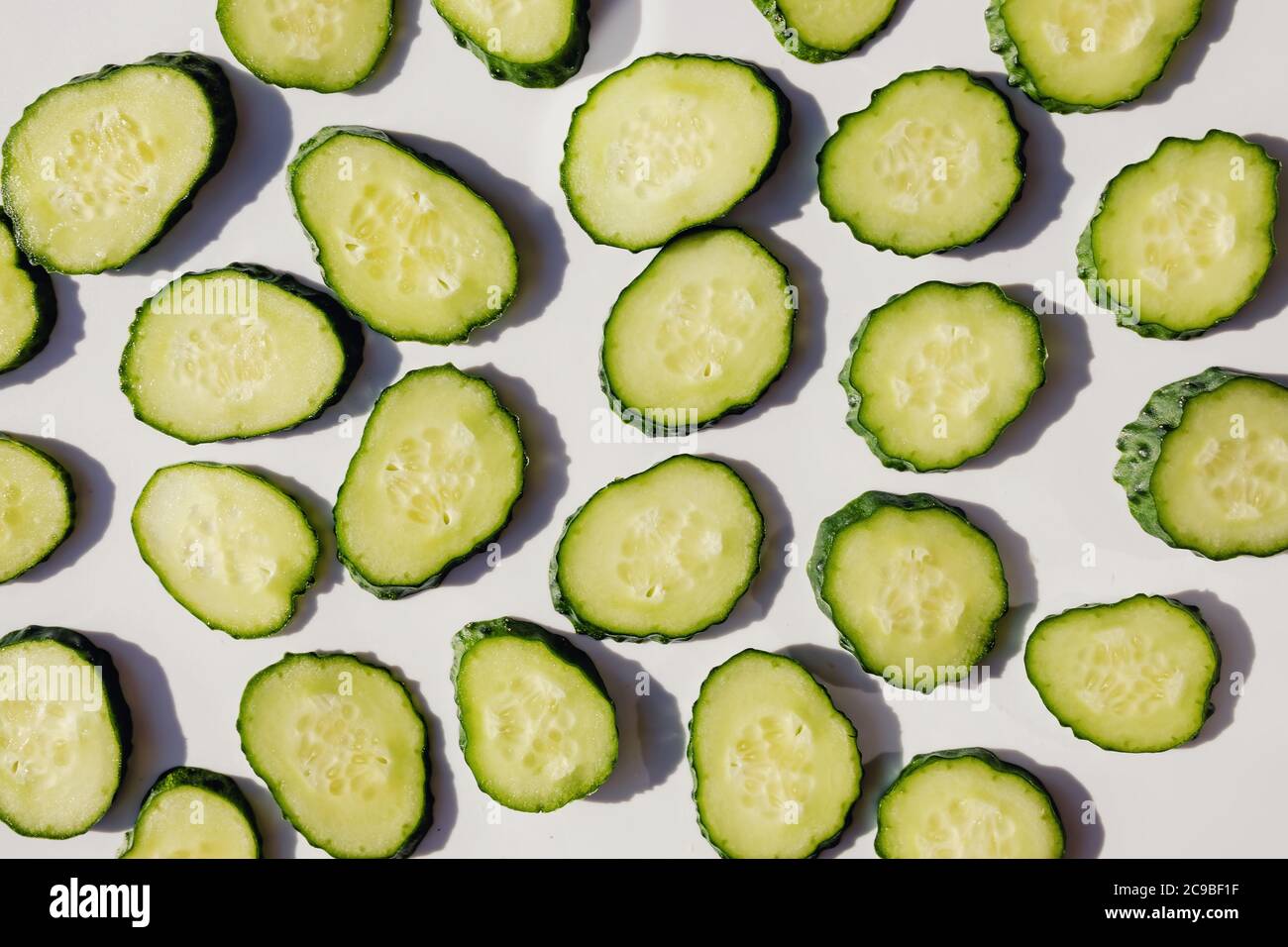 Fresh cucumber slices on white background Stock Photo