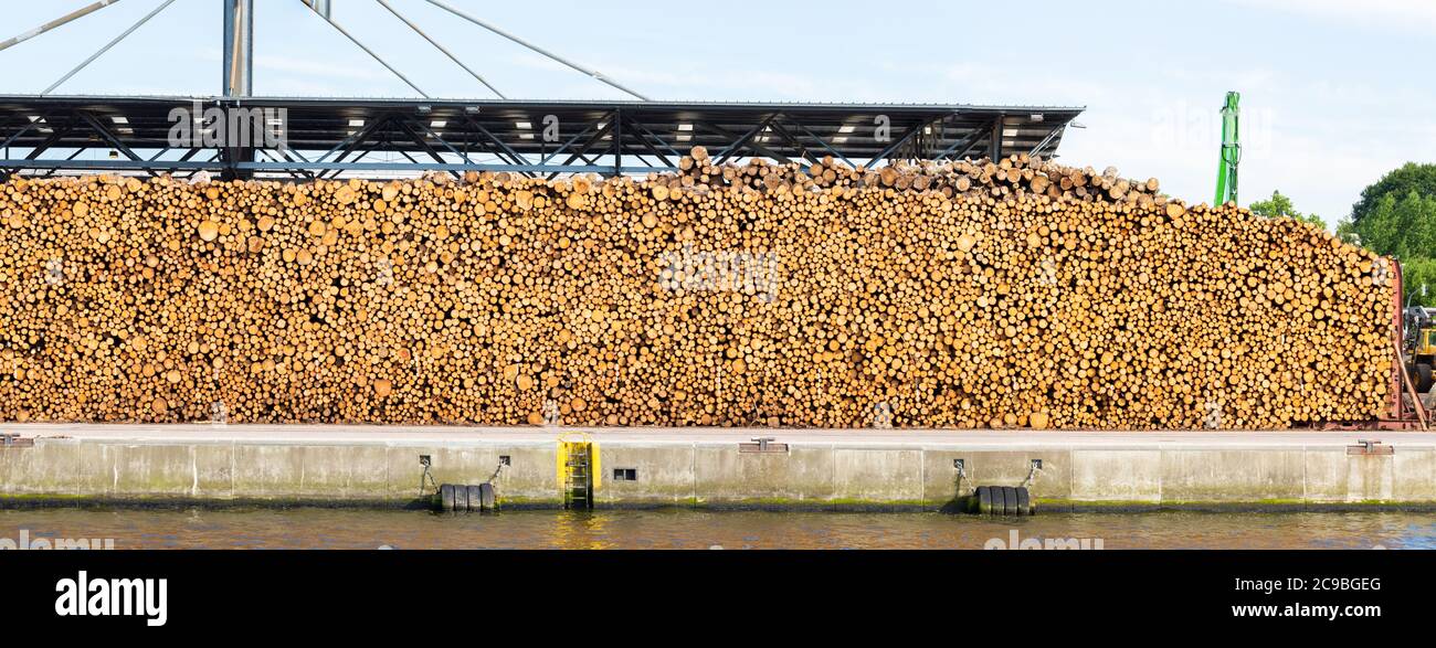 Timber Ship Stack Large wood stack at a dock at River Trave (close to the Baltic Sea ...