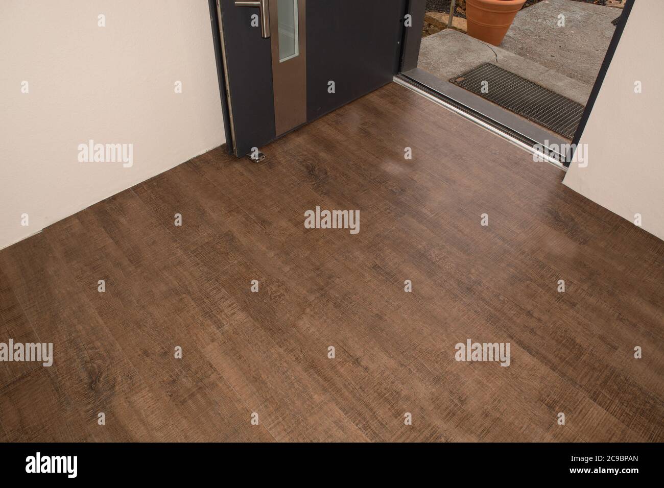 Laminate flooring. Threaded panel of a laminate floor on a thermally insulated floor. Electric