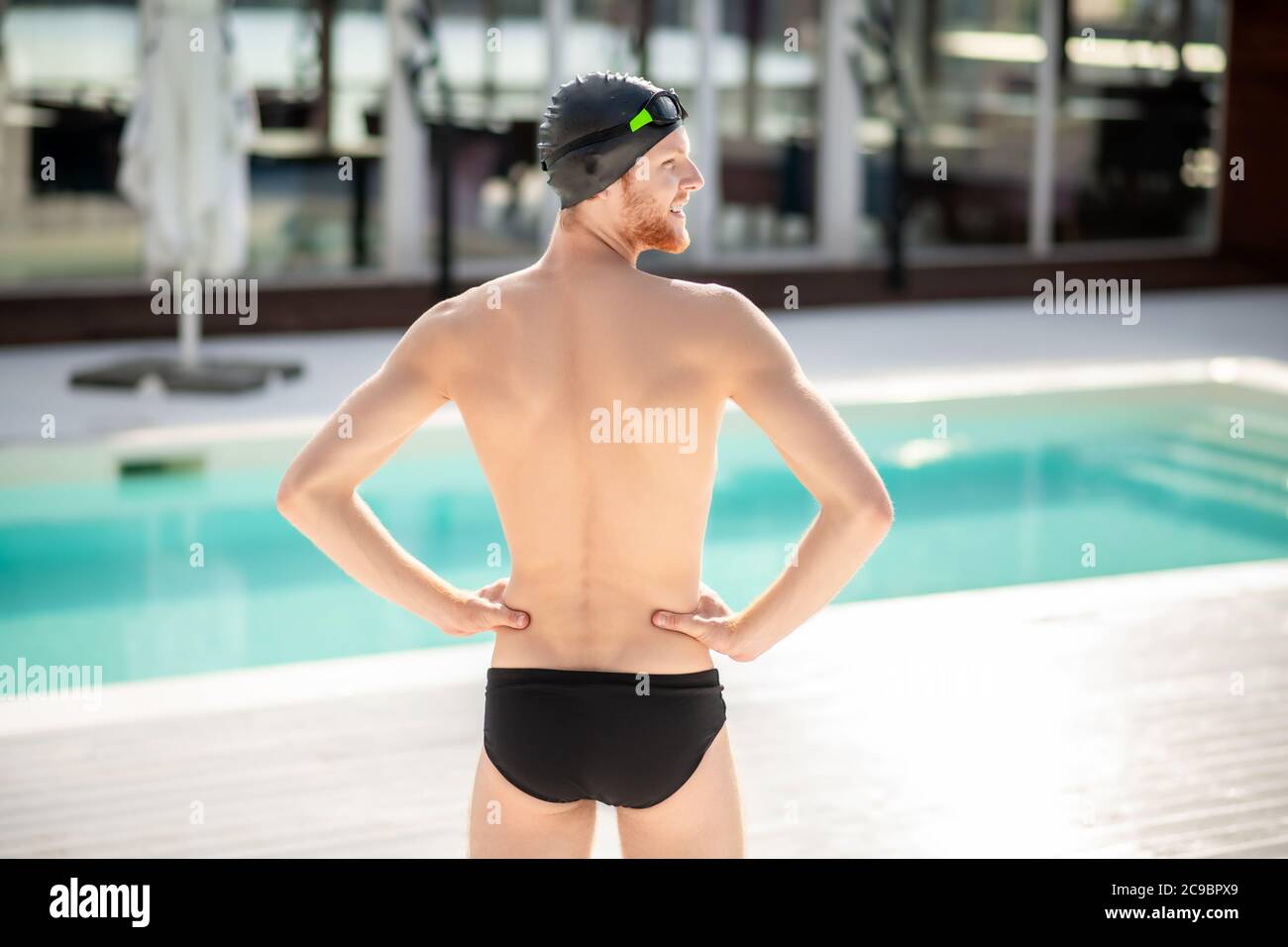 Man standing with his back to camera Stock Photo - Alamy
