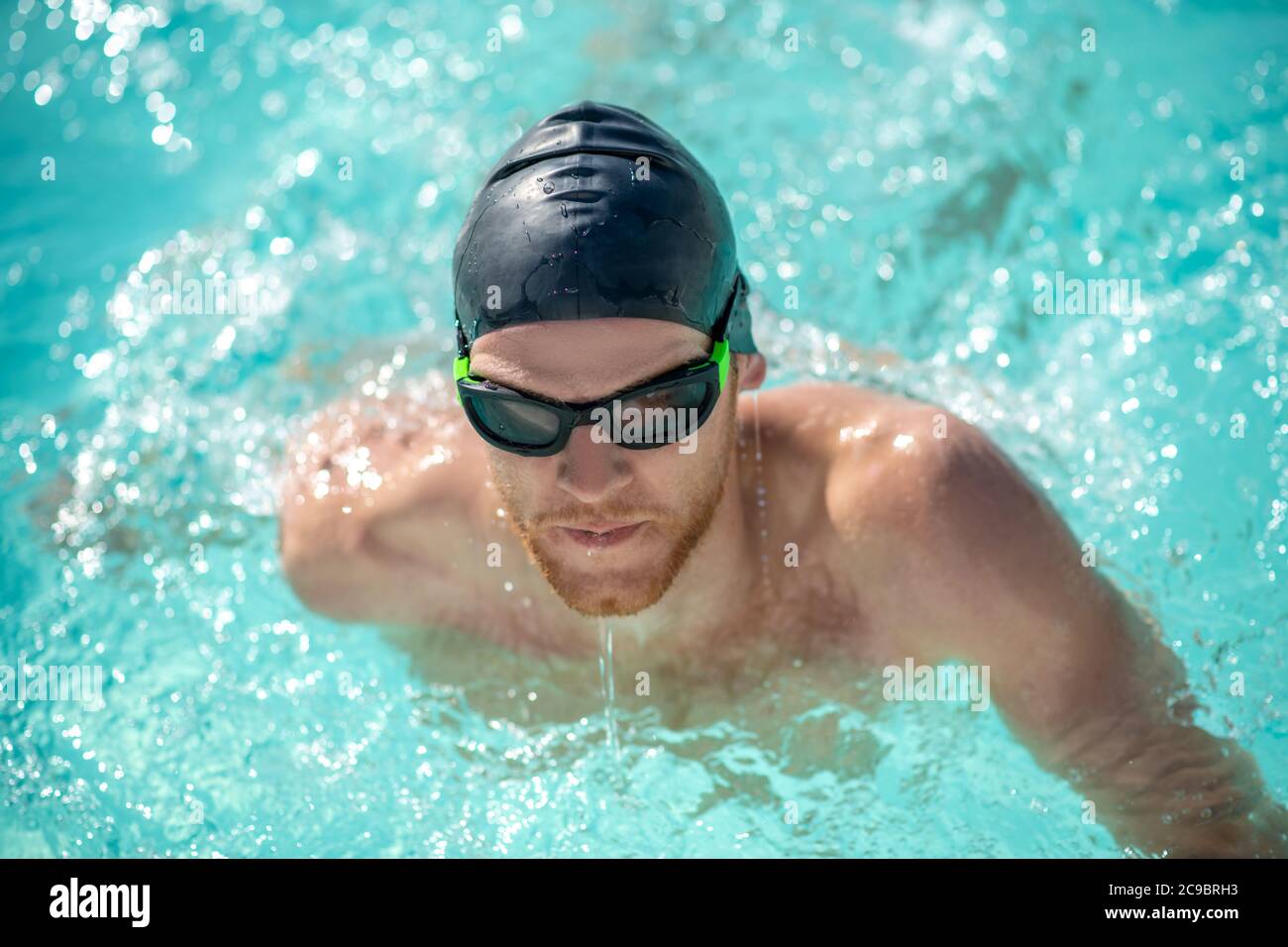 Close up face of swimming swimmer in water Stock Photo - Alamy