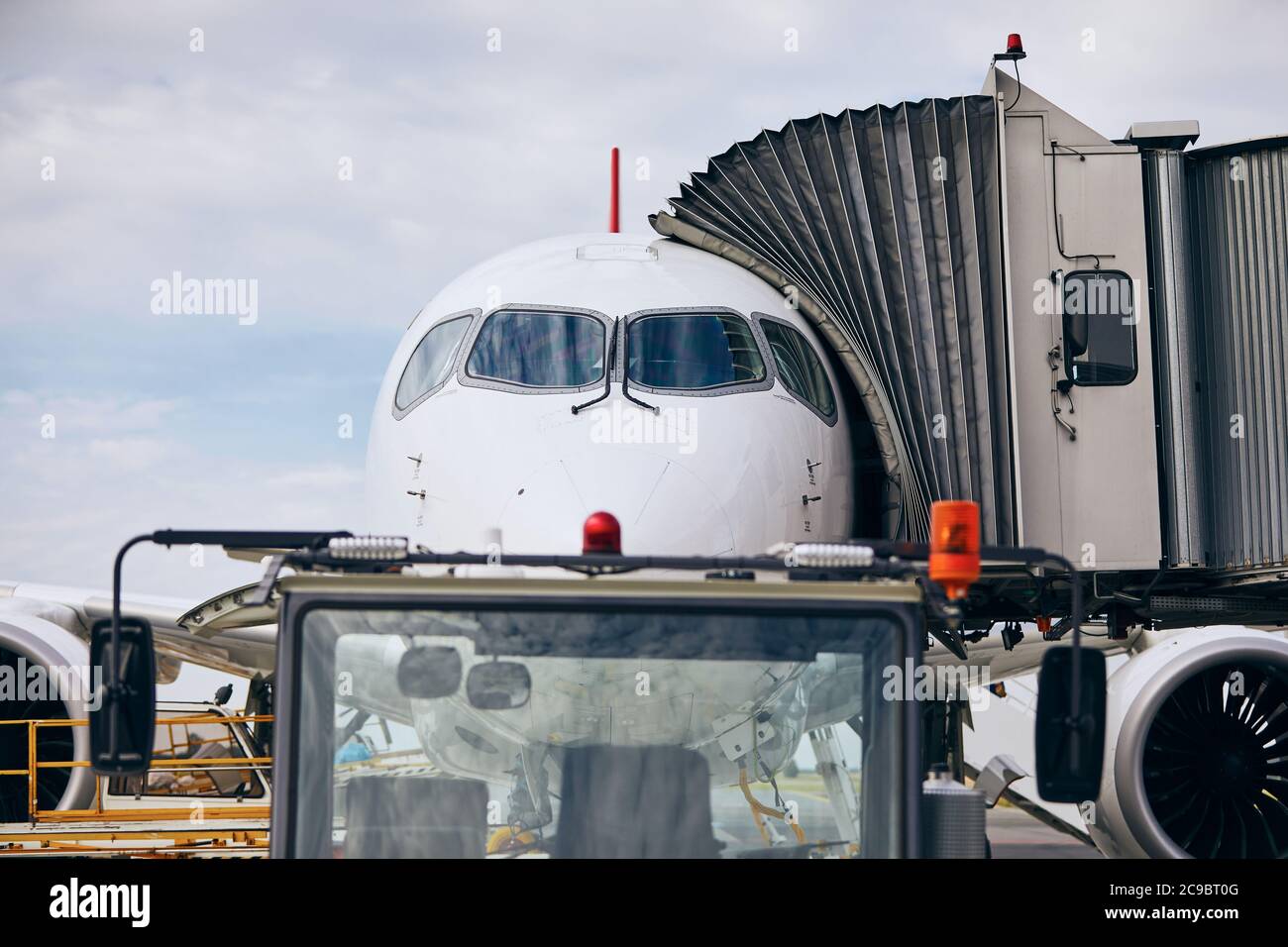 Front view of airplane at airport. Preparation passenger plane before flight. Stock Photo