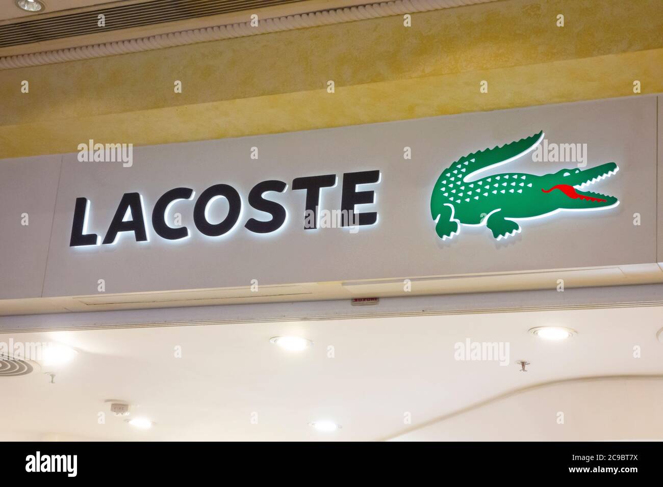 Macau, China - April 17, 2015: Lacoste store sign. Lacoste is a French company, founded in 1933 by tennis player Rene Lacoste and Andre Gillier. Stock Photo