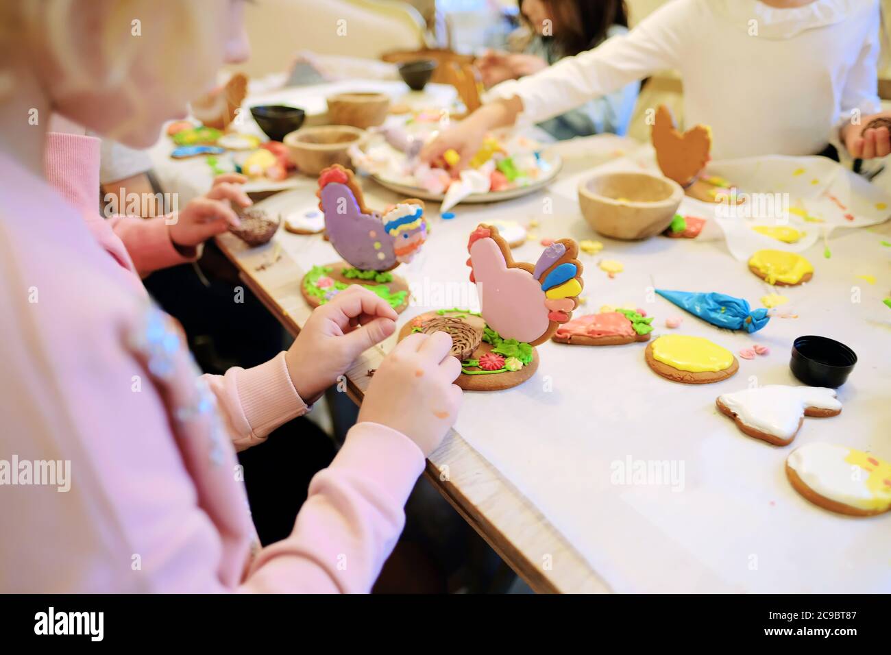 Children Making Gingerbread Children's hands make gingerbread. children cutting cookies. Kids ...