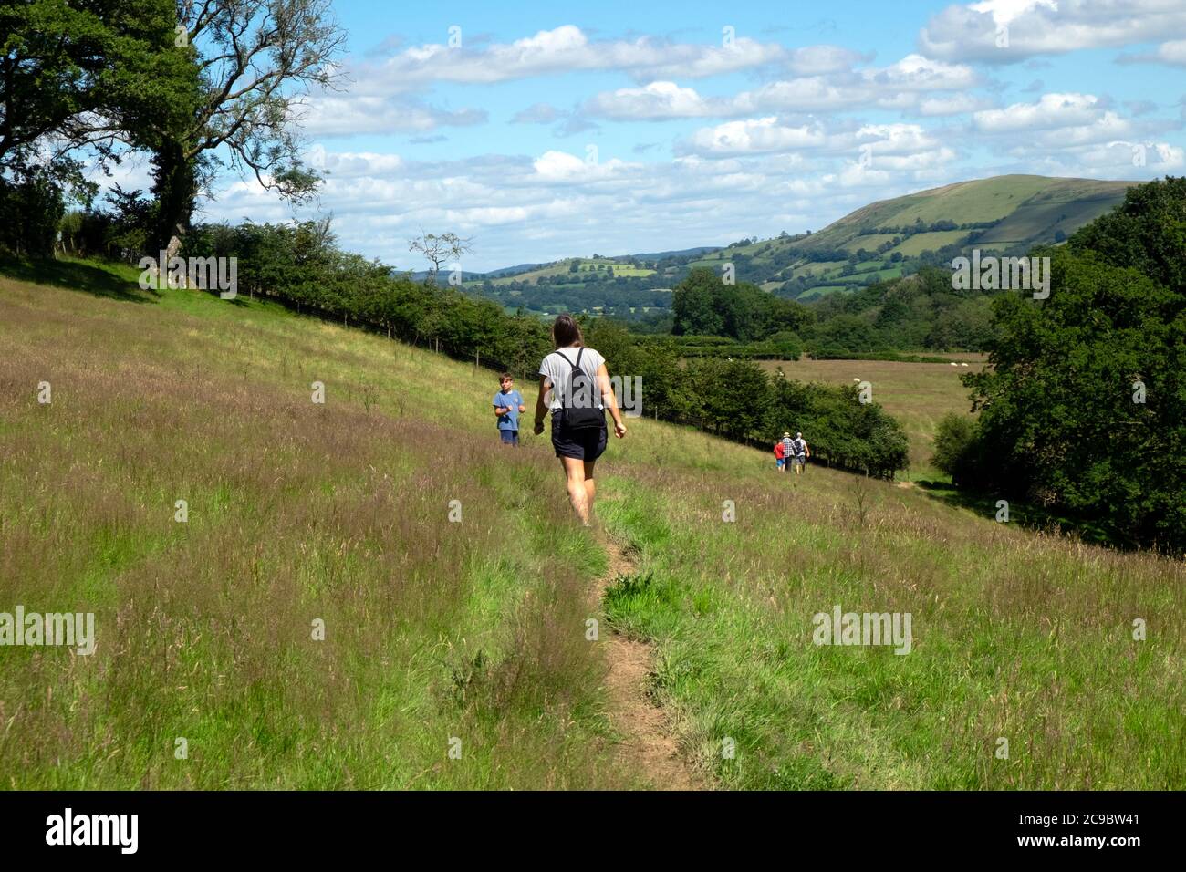 Woman and child family on staycation walking in the countryside after Covid 19 lockdown is eased in July 2020 Carmarthenshire Wales UK  KATHY DEWITT Stock Photo