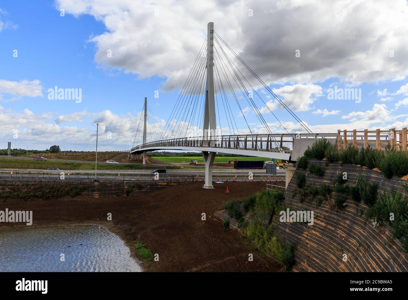 Highways Agency built Cable Stayed steel footbridge cycle and footway over A14 at Bar Hill , Cambridgeshire, Cambs, England, uk Stock Photo