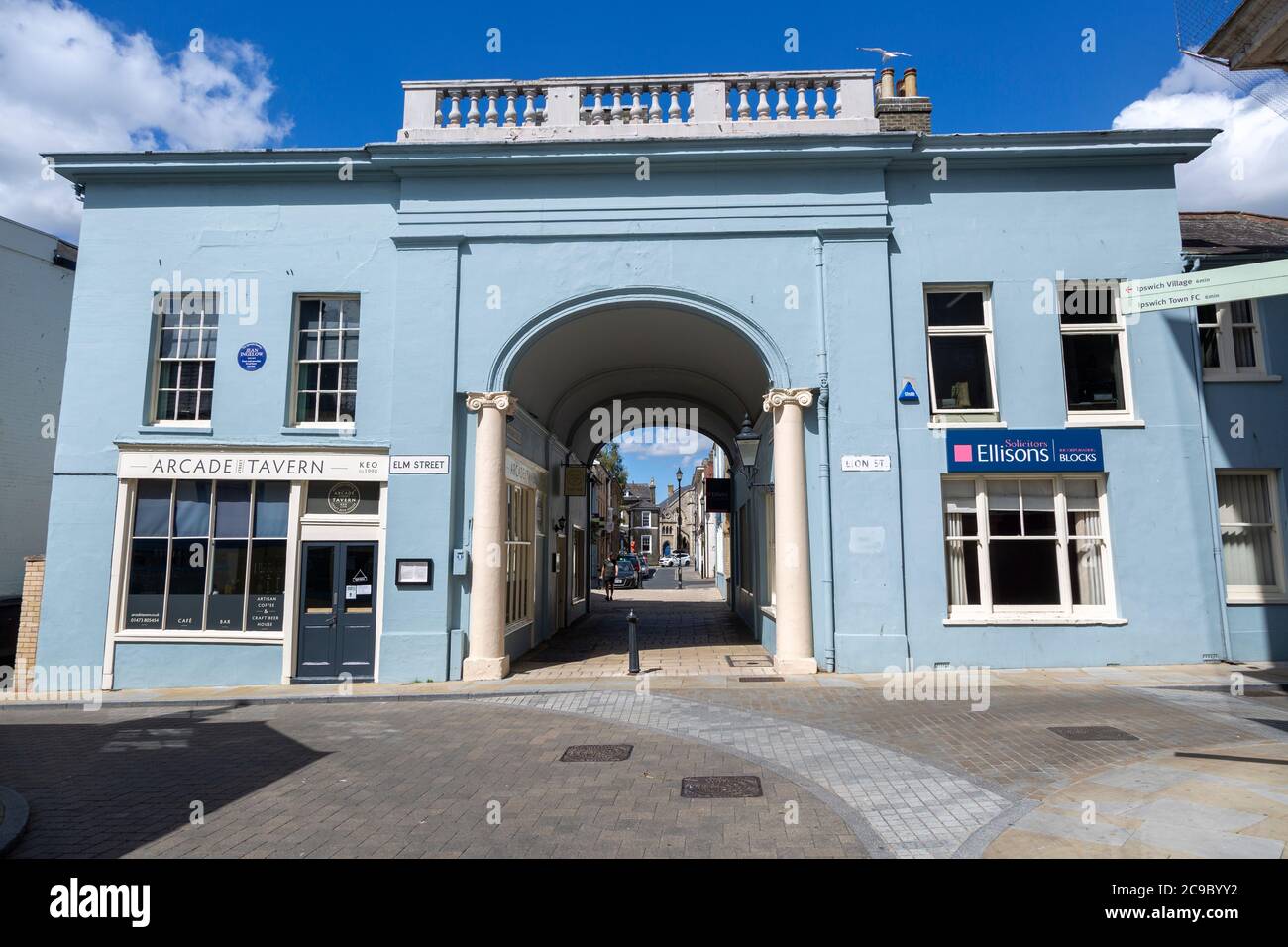 Archway entrance to Arcade Street showing the Arcade tavern pub, Ipswich, Suffolk, England, UK Stock Photo