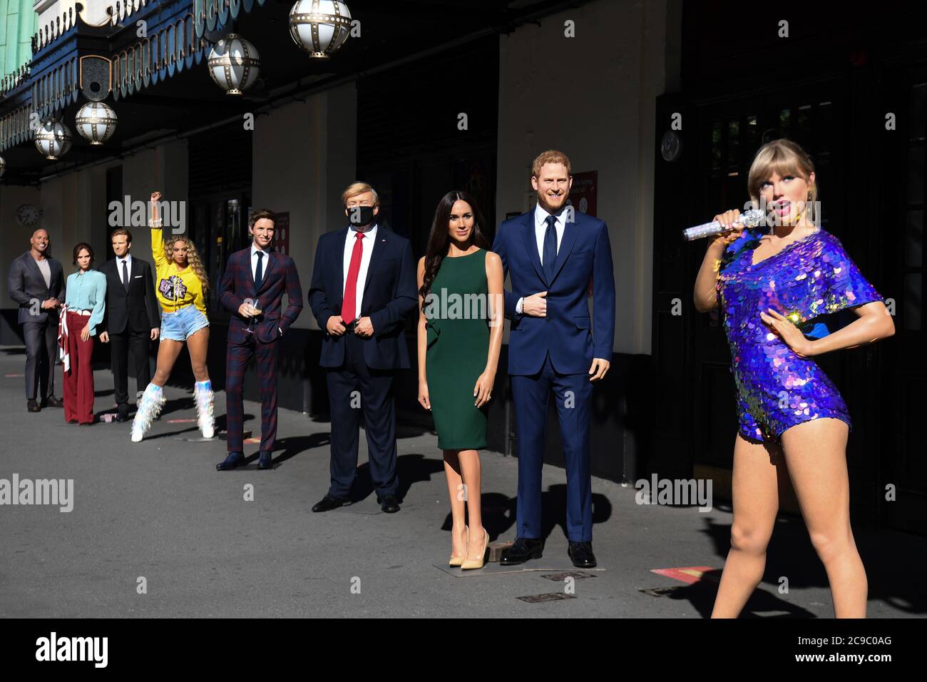 Wax figures, including US President Donald Trump, Taylor Swift and the Duke and Duchess of Sussex in the entrance line at Madame Tussaud's in London, as the attraction prepares to reopen to the public following the easing of lockdown restrictions in England. Stock Photo