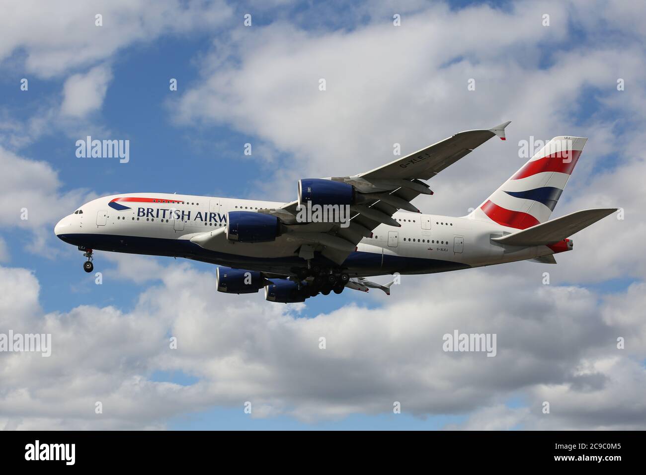 An Airbus A380-841 flying for British Airways lands at London Heathrow Airport Stock Photo