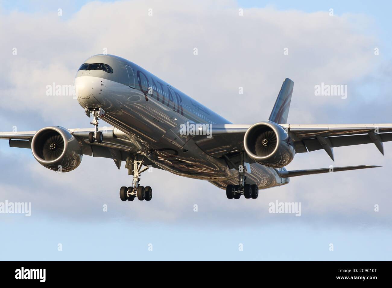 An Airbus A350 941 Flying For Qatar Airways Lands At London Heathrow Airport Stock Photo Alamy