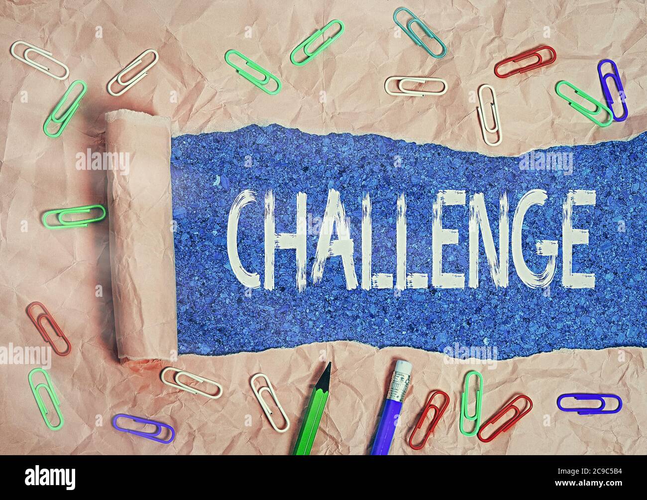 Text sign showing Challenge. Business photo text process of provoking or testing physiological activity by exposure Rolled ripped torn cardboard place Stock Photo
