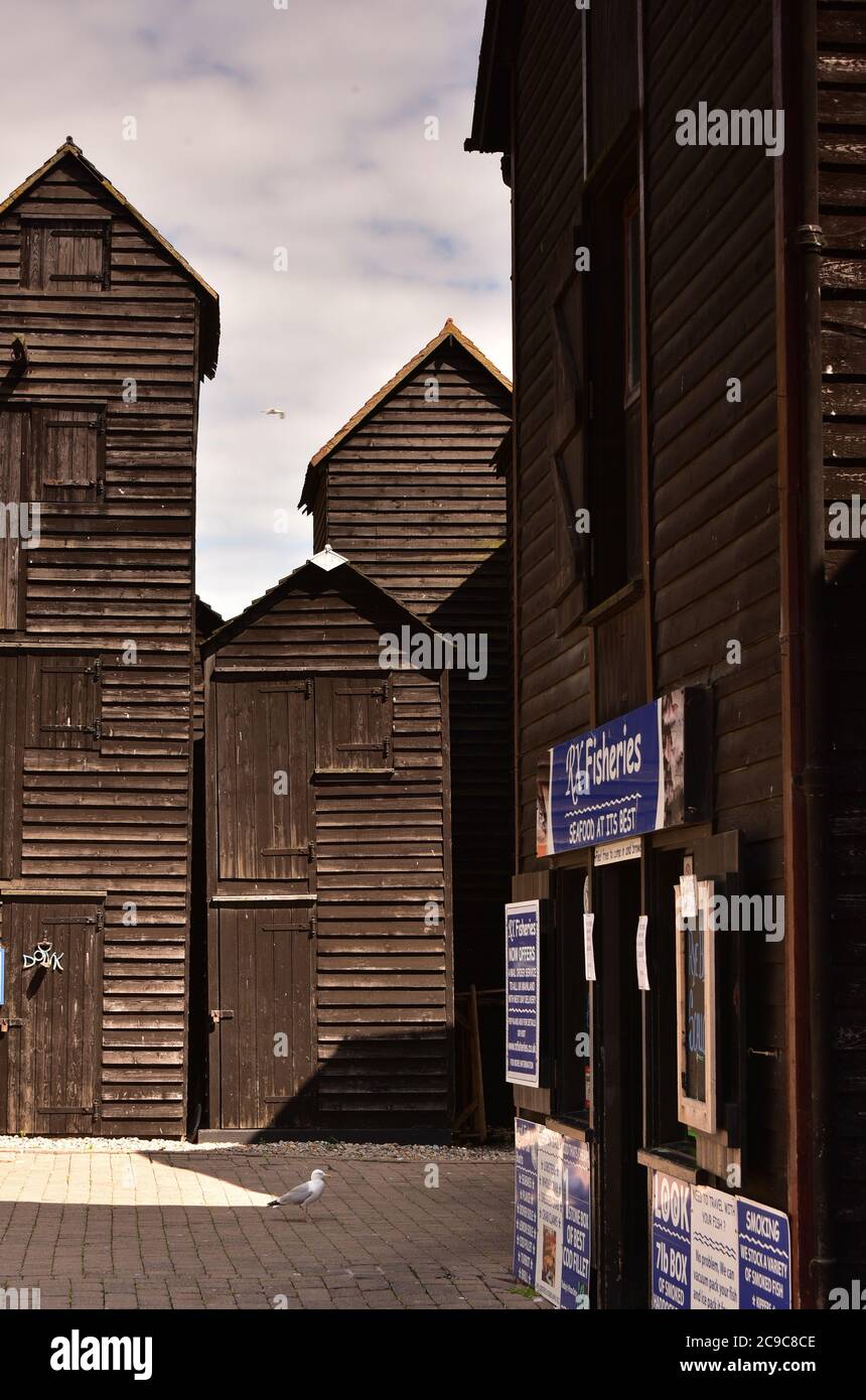 Black Fishing Net Sheds in Hastings, Kent, England Stock Photo