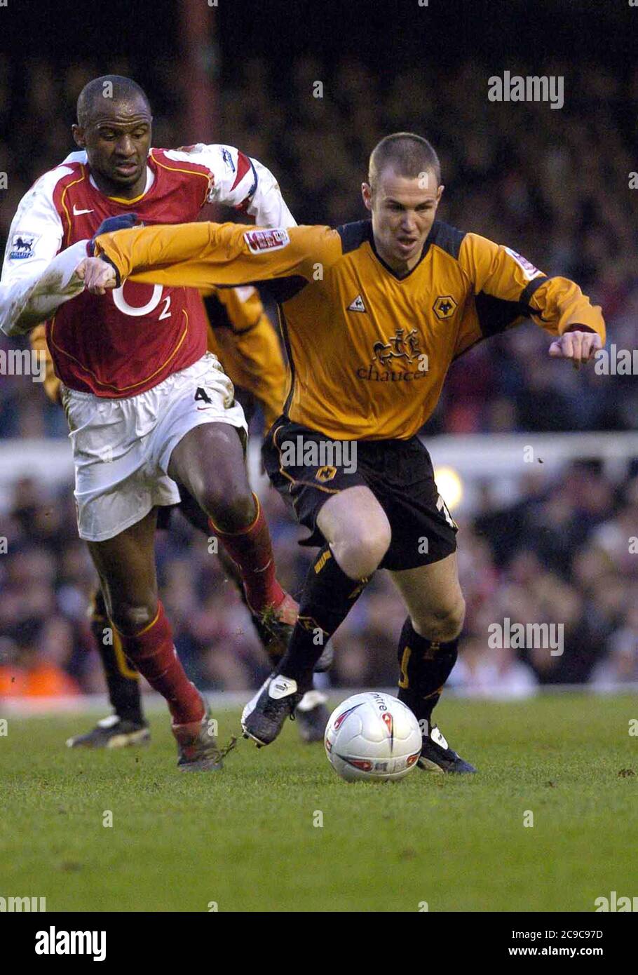 Arsenal v Wolverhampton Wanderers, 29 January 2005 at Highbury. FA Cup 4th round. Kenny Miller and Patrick Vieira Stock Photo
