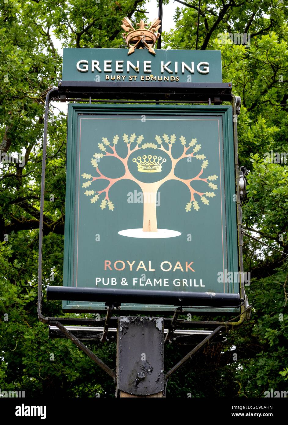Traditional hanging pub sign at The Royal Oak public house, Charlton, Andover, Hampshire, England, UK Stock Photo