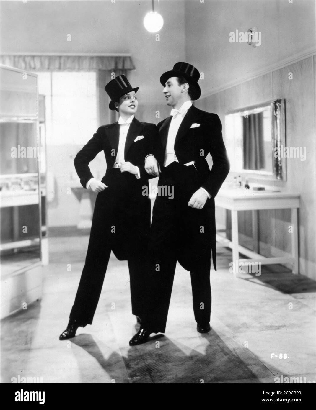 JESSIE MATTHEWS and SONNIE HALE in FIRST A GIRL 1935 director VICTOR SAVILLE Gaumont British Picture Corporation Stock Photo