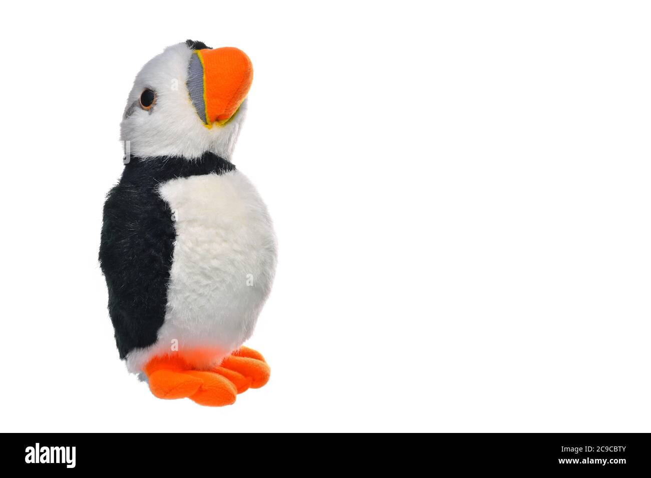 Puffin bird soft toy, seabird animal isolated on white background with copy space. Stock Photo