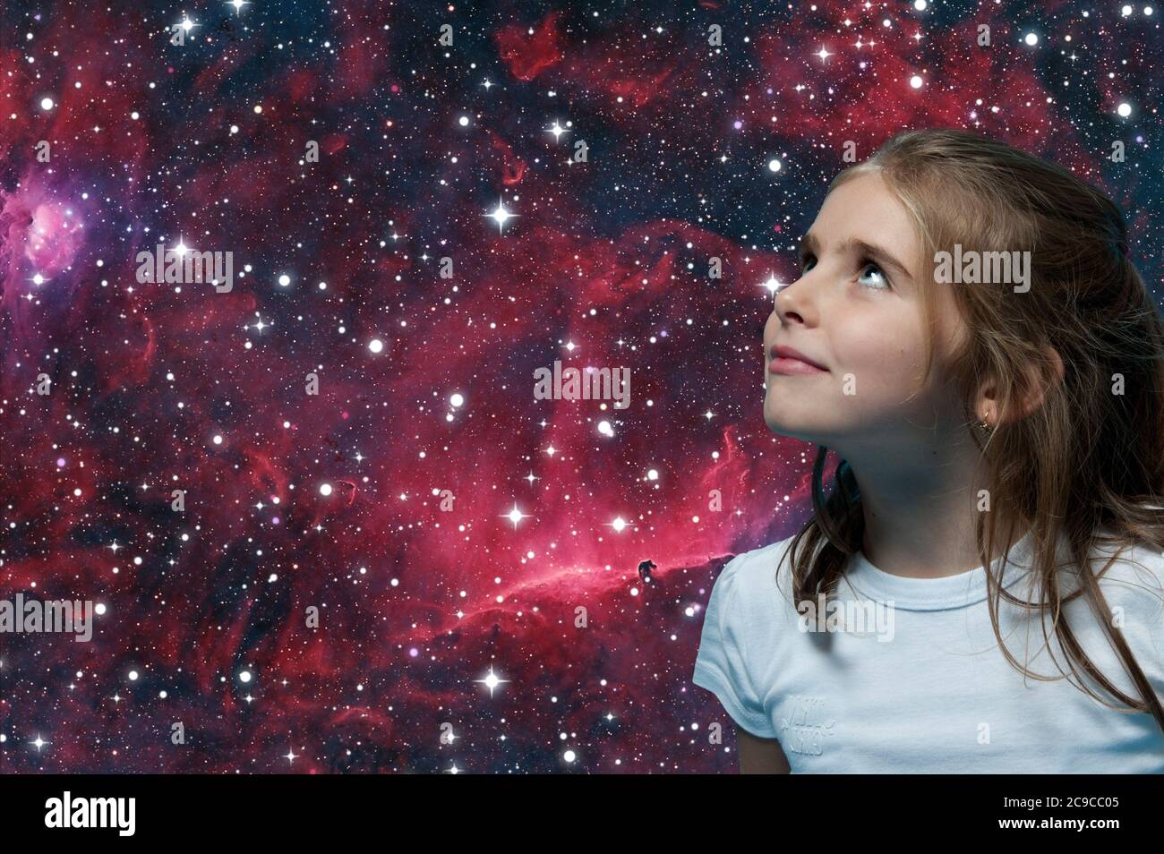 young girl looking at the stars Stock Photo