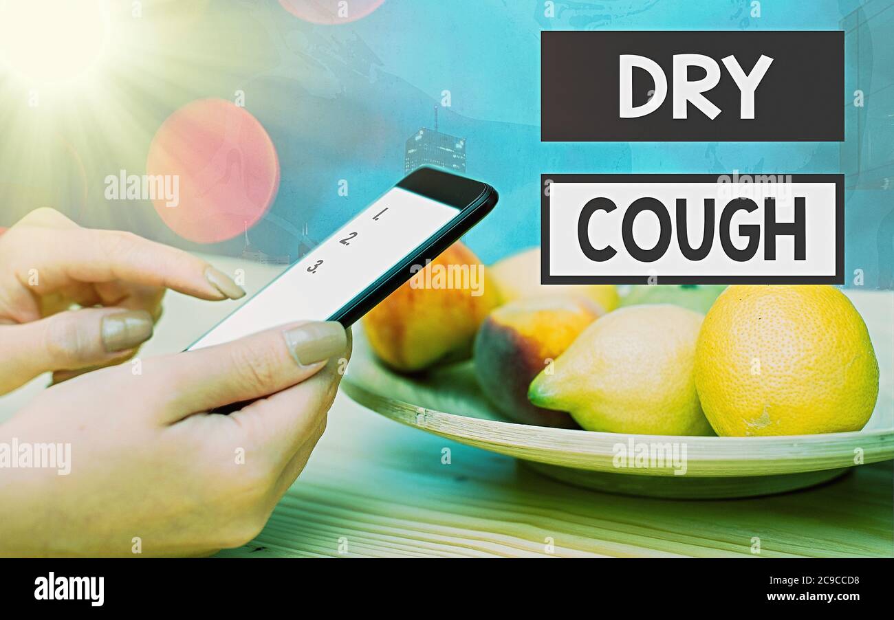 Handwriting text Dry Cough. Conceptual photo cough that are not accompanied by phlegm production or mucus Modern gadgets with white display screen und Stock Photo