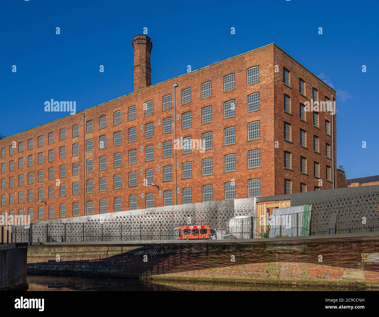 Impressive facade of Murrays' Mills (building began 1797) near Rochdale Canal, Ancoats, Manchester Stock Photo