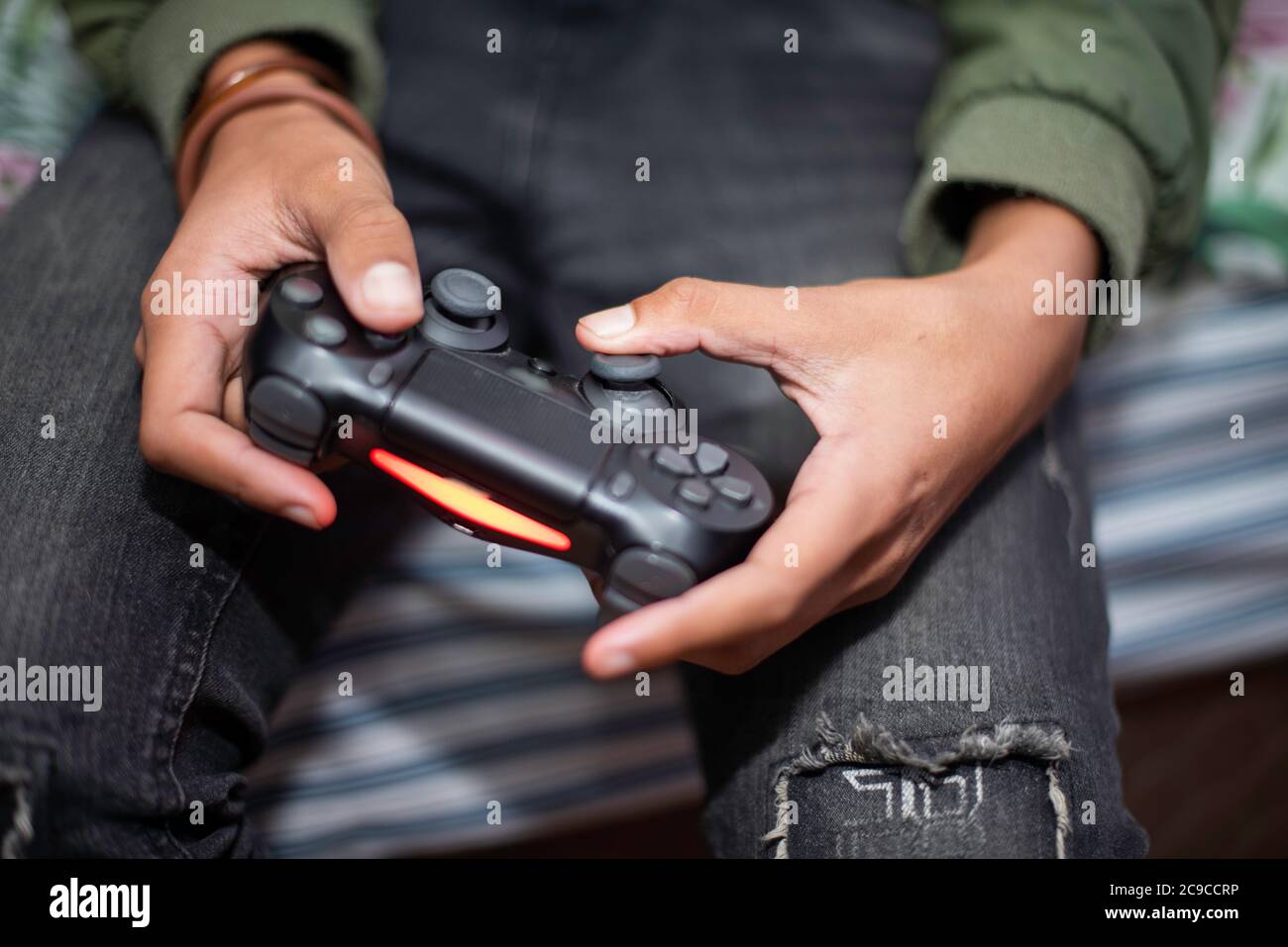 Close up shot of hands on controller Stock Photo Alamy