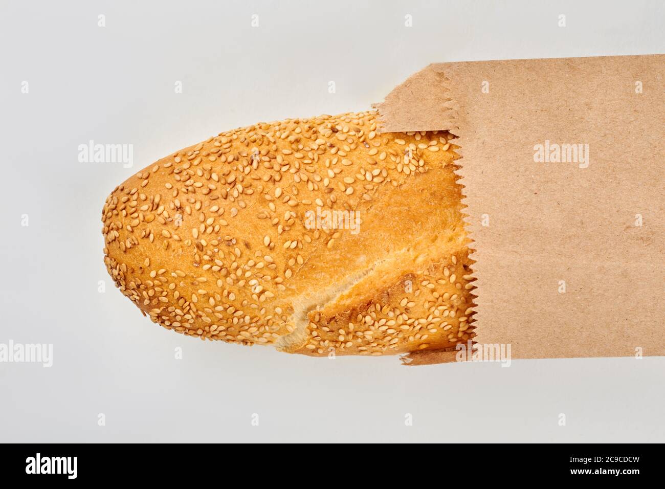French baguette in craft paper bag Stock Photo - Alamy