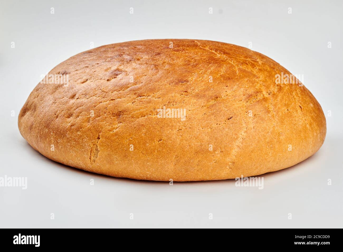 Round loaf of bread on white background Stock Photo Alamy