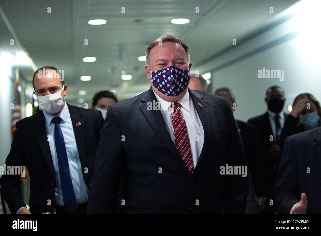 Washington, United States Of America. 30th July, 2020. United States Secretary of State Mike Pompeo, center, arrives to testify before the U.S. Senate Committee on Foreign Relations on Capitol Hill in Washington, DC, U.S. on Thursday, July 30, 2020. Credit: Stefani Reynolds/CNP | usage worldwide Credit: dpa/Alamy Live News Stock Photo