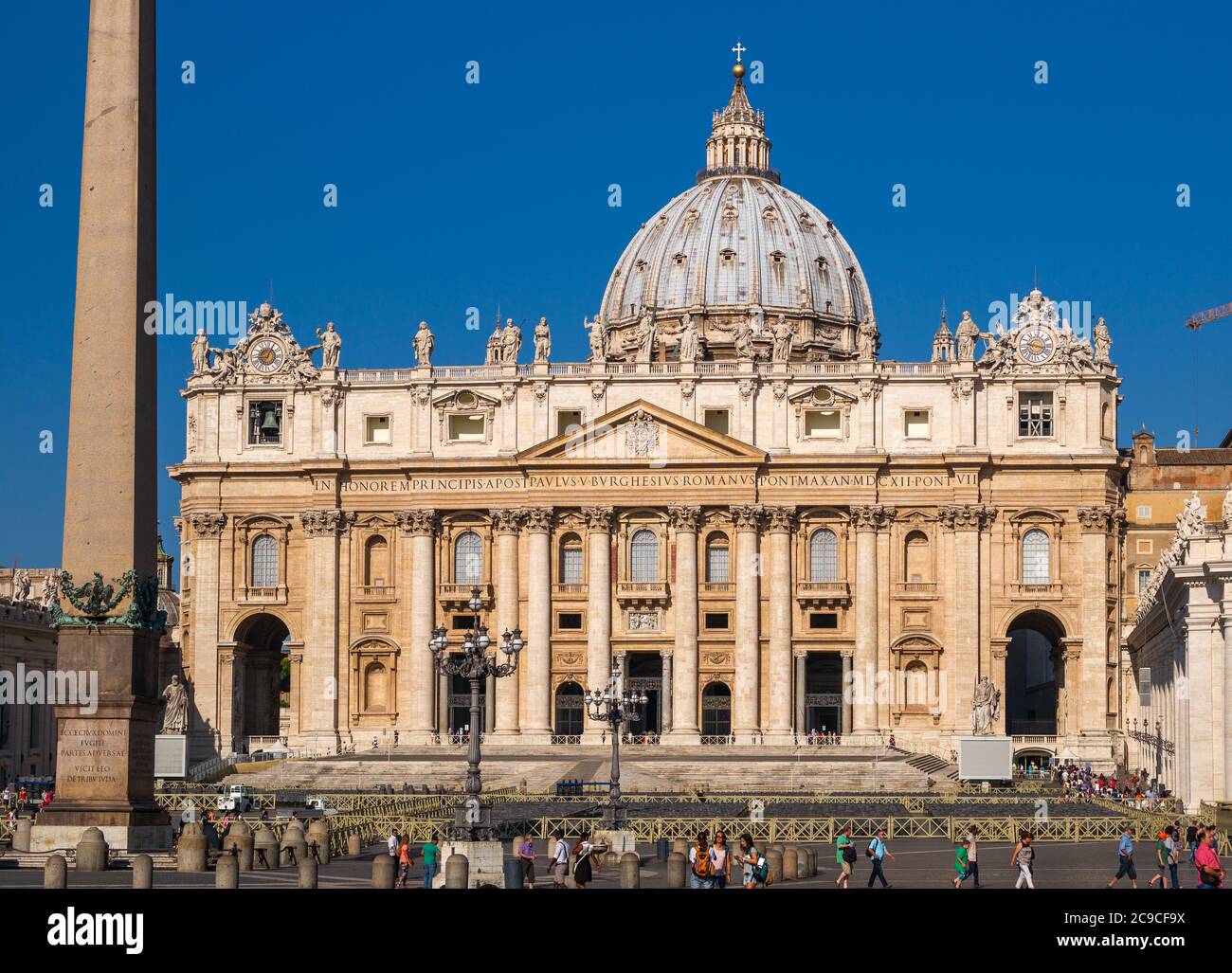 Direct shot against blue sky of St Peter's Basilica, the largest church in the world, built in Renaissance style. Rome, Italy. Stock Photo