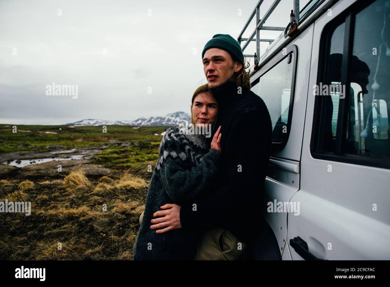 Couple making a wanderlust vacation, exploring iceland with their 4x4