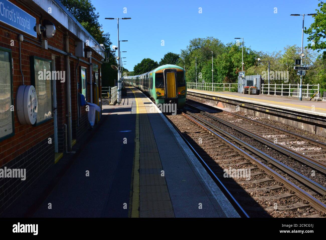 British Rail Class 377 Electrostar At Christs Hospital Station Stock british-rail-class-377-electrostar-at-christs-hospital-station-stock
