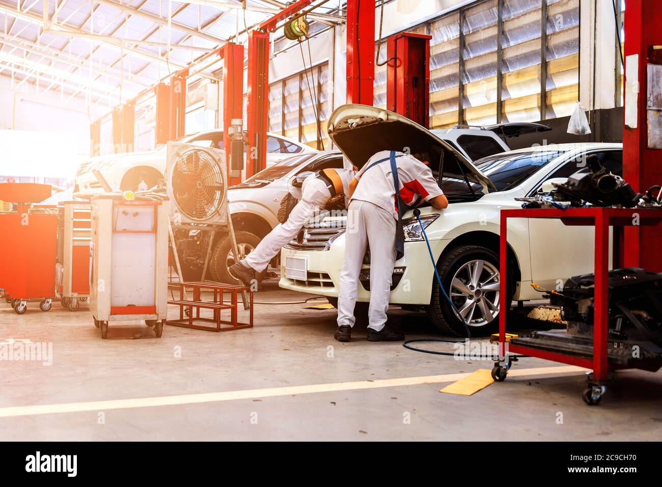 car in automobile repair service center with soft-focus and over light in  the background Stock Photo - Alamy