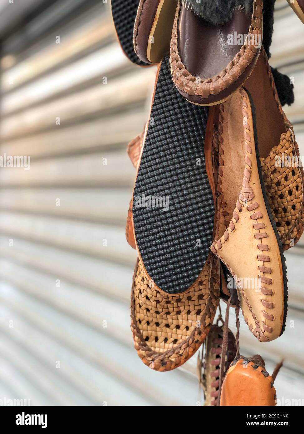 handmade leather shoes hanged in the bazaar in Turkey Stock Photo Alamy