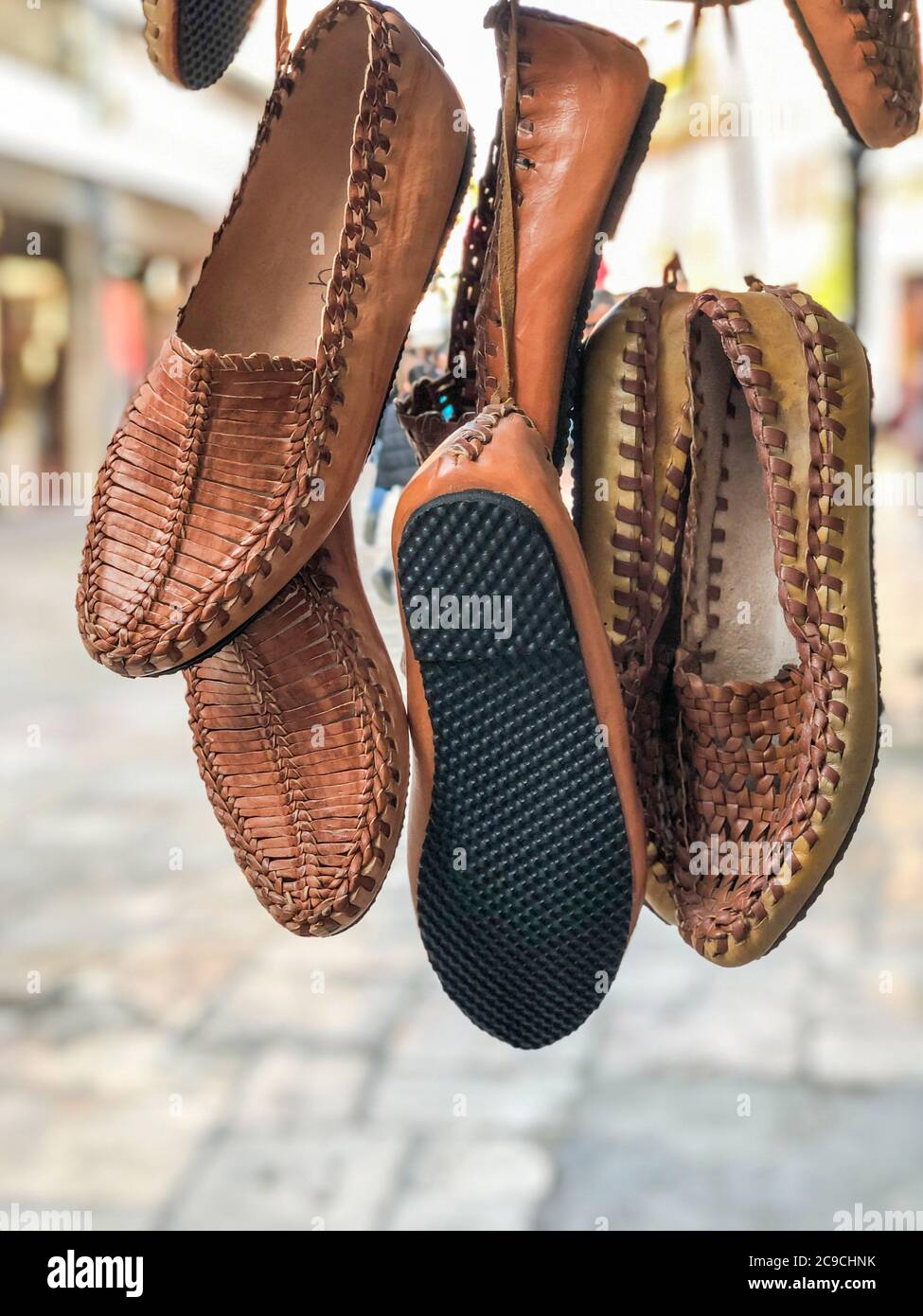 handmade leather shoes hanged in the bazaar in Turkey Stock Photo Alamy