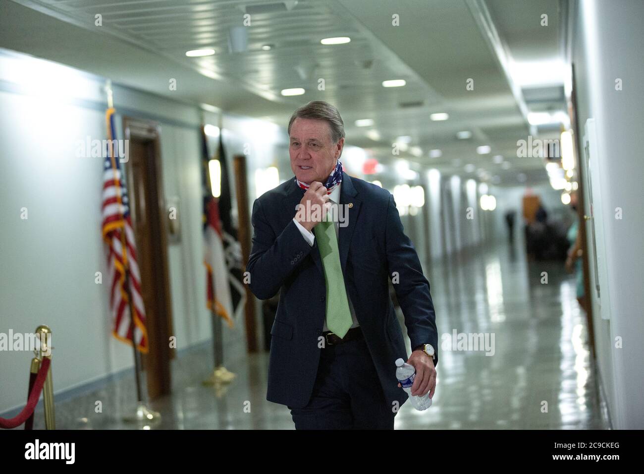 Washington, United States Of America. 30th July, 2020. United States Senator David Perdue (Republican of Georgia) arrives to the U.S. Senate Committee on Foreign Relations hearing, where United States Secretary of State Mike Pompeo will testify on Capitol Hill in Washington, DC, U.S. on Thursday, July 30, 2020. Credit: Stefani Reynolds/CNP | usage worldwide Credit: dpa/Alamy Live News Stock Photo