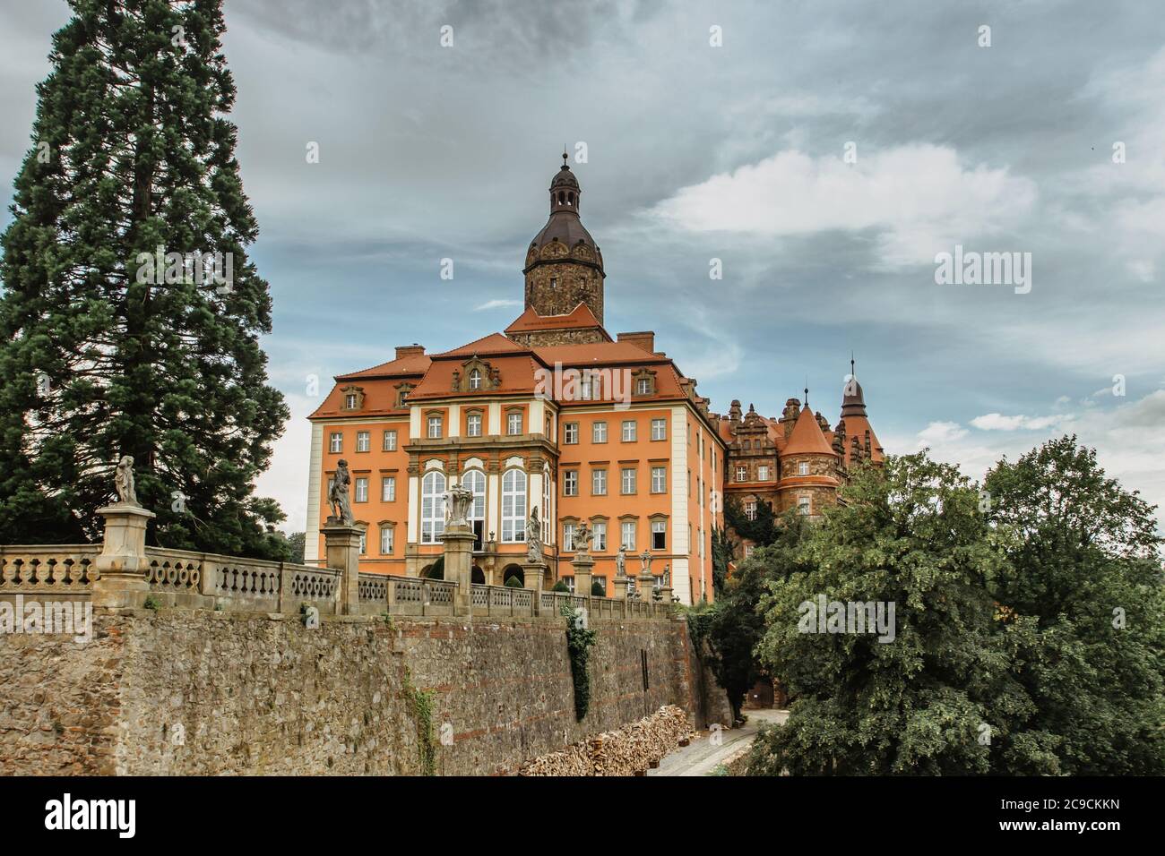 Ksiaz, Poland - July 26, 2020. An impressive view of the majestic Ksiaz Castle. The thrid biggest castle in Poland located on a rock cliff.Popular tou Stock Photo