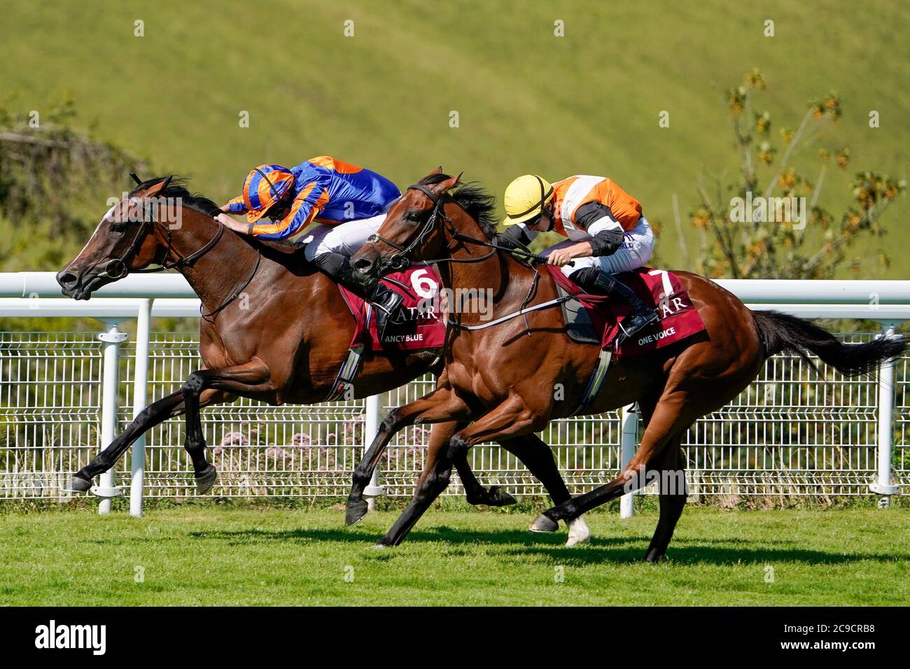 Fancy Blue ridden by Ryan Moore (left) wins The Qatar Nassau Stakes during day three of the Goodwood Festival at Goodwood Racecourse, Chichester. Stock Photo