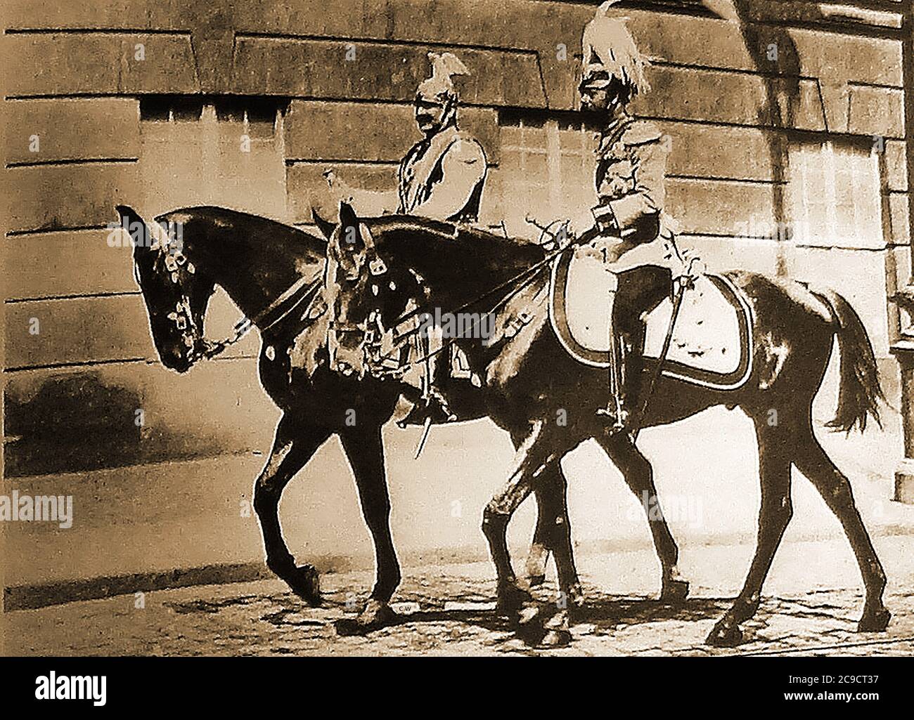May 1913 - King George V of Britain rides with the Kaiser of Germany at Potsdam .  King George Frederick Ernest Albert 1865 –  1936  ( King of the United Kingdom and the British Dominions, and Emperor of India) is seen with the German Kaiser (Friedrich Wilhelm Viktor Albert;    1859 –  1941) in preparation for reviewing troops. The Kaiser was the eldest grandchild of Queen Victoria of Britain Stock Photo