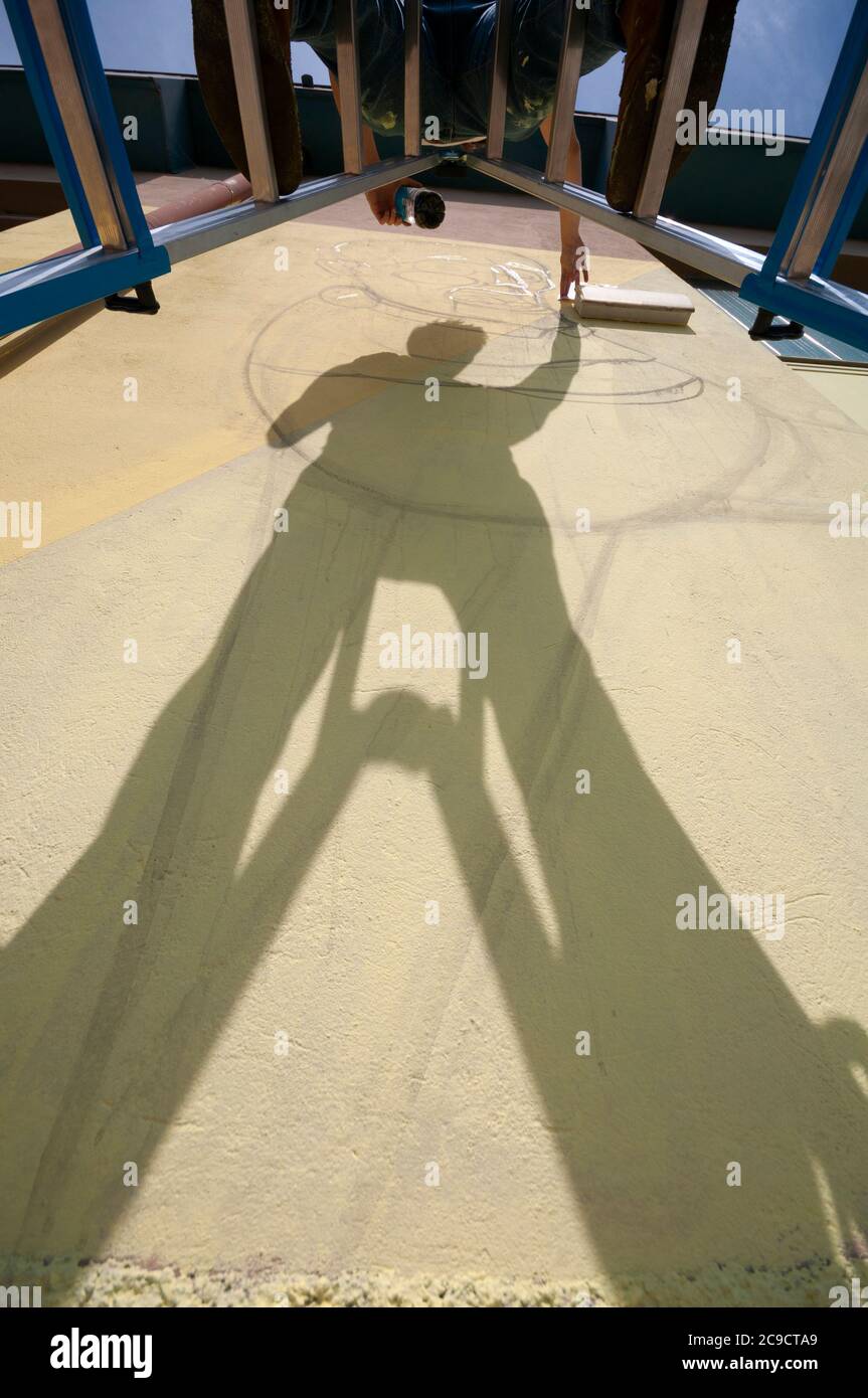 Man painting mural on wall hi-res stock photography and images - Alamy