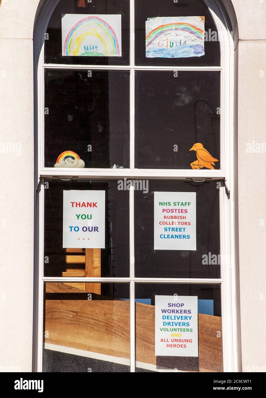 thank you NHS and key workers homemade signs displayed in windows covid-19 thank you notes to front line workers Stock Photo