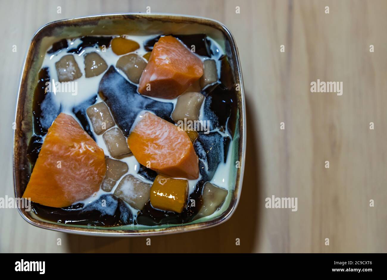 Traditional taiwanese iced dessert with Grass jelly, Taro balls, Tofu