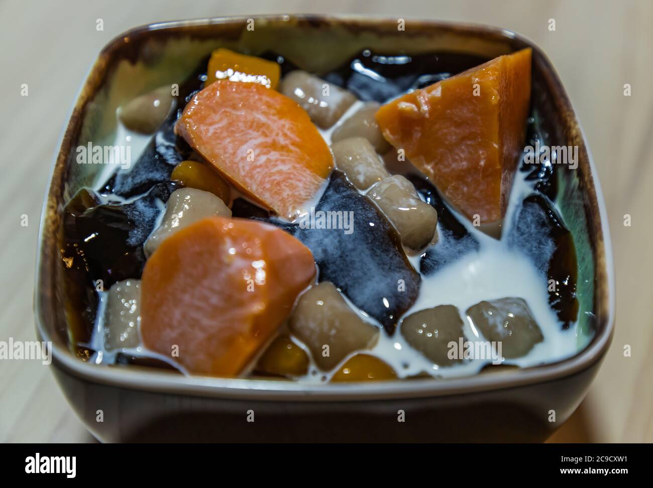 Traditional taiwanese iced dessert with Grass jelly, Taro balls, Tofu