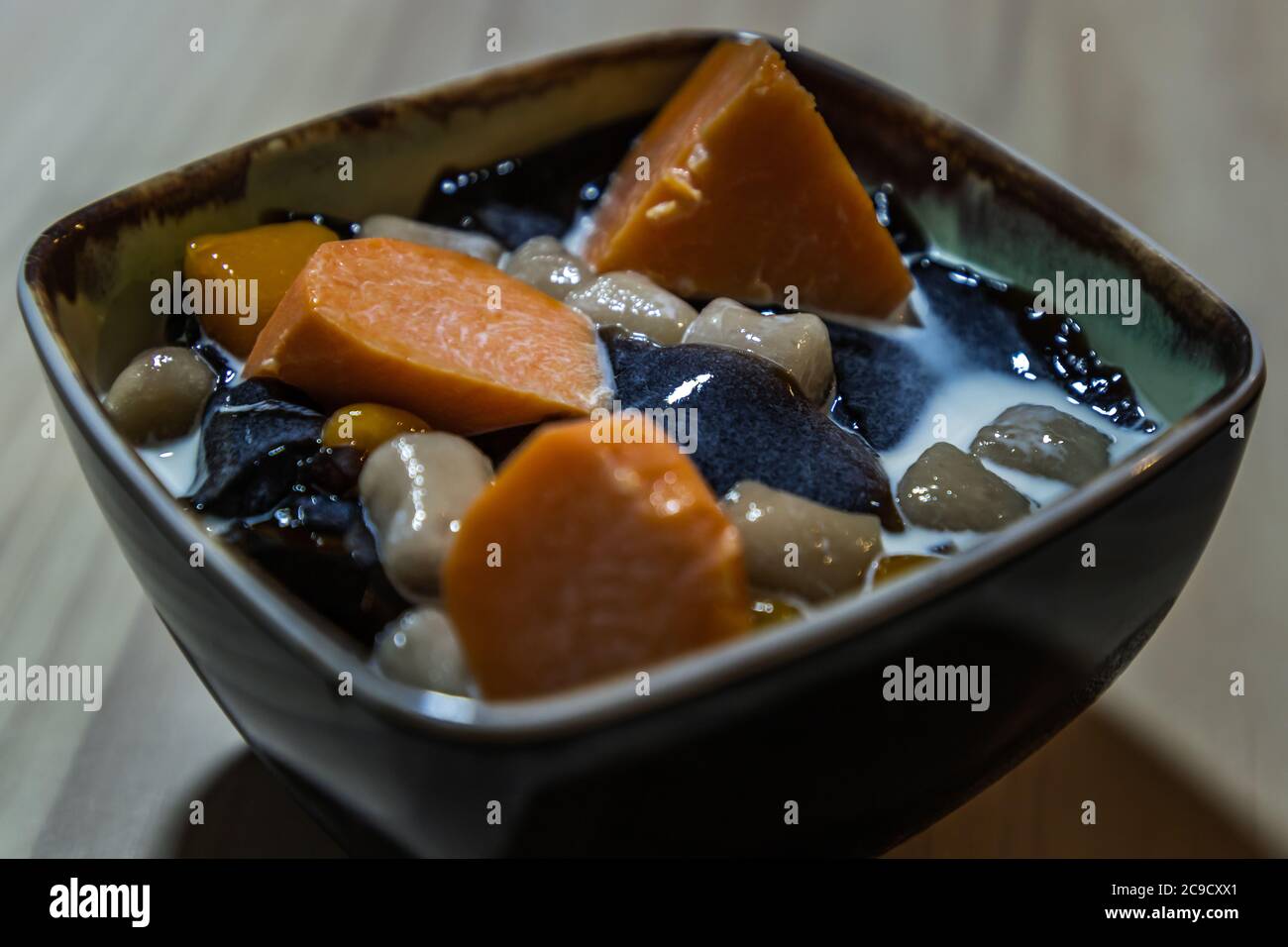 Traditional taiwanese iced dessert with Grass jelly, Taro balls, Tofu