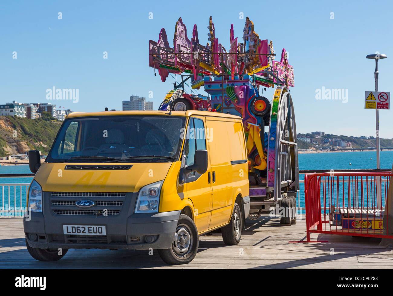 Fairground ride on Bournemouth Pier waiting to be assembled at Bournemouth, Dorset UK in July Stock Photo