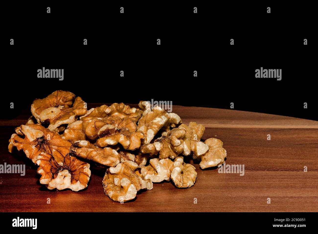 Walnuts on Walnut Stock Photo